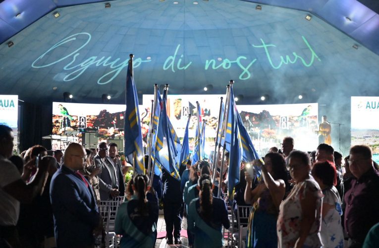 Un escenario cu a pone enfasis riba locual ta di Aruba