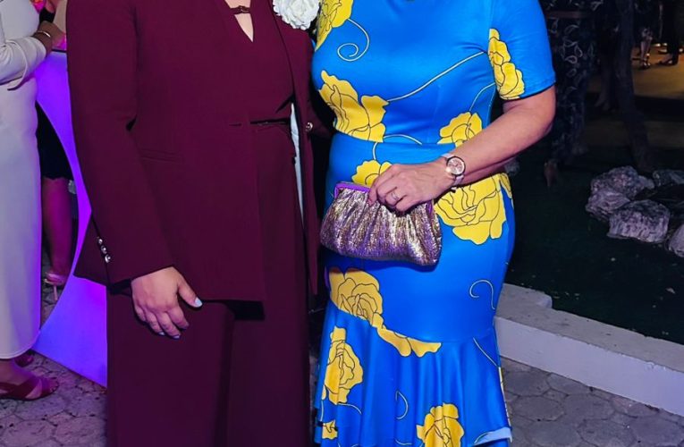 EVELYN WEVER-CROES TA FELICITA SUE-ANN LEE CU SU NOMBRAMENTO COMO RECTOR NOBO DI UNIVERSIDAD DI ARUBA